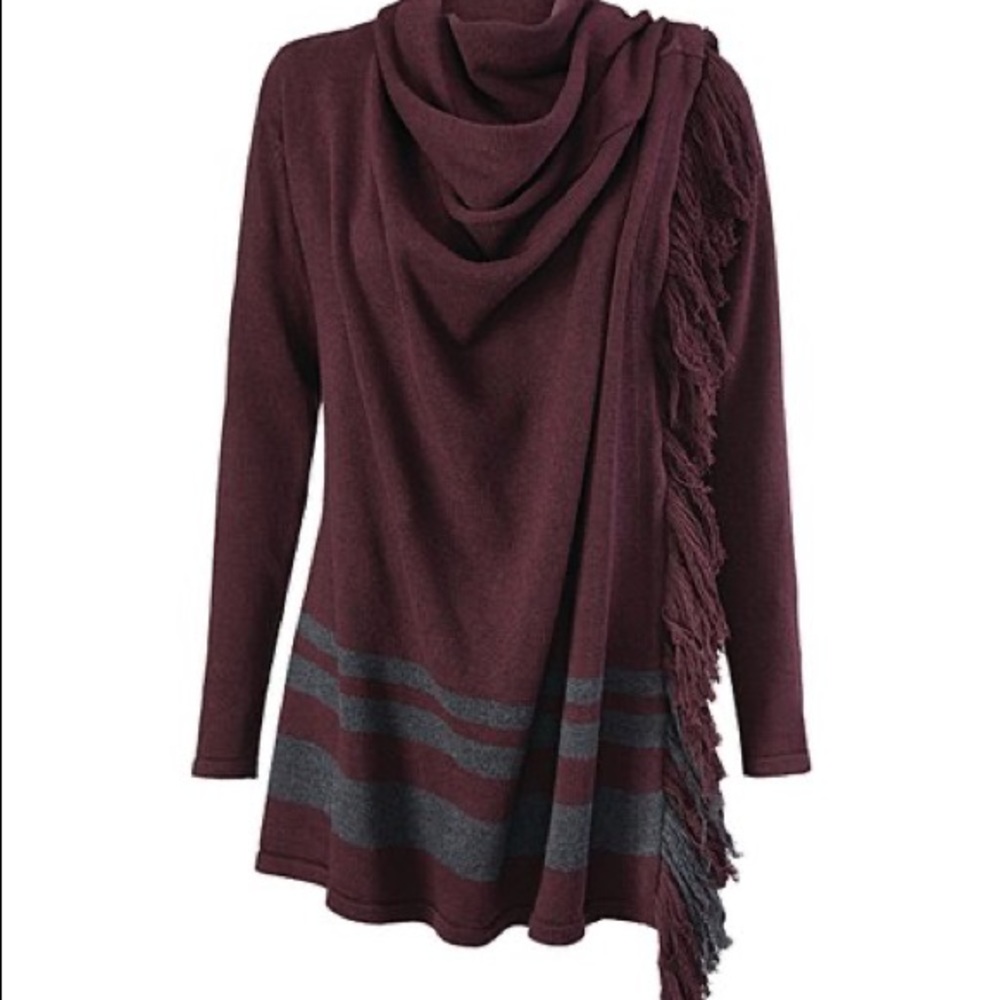 CAbi sweater wrap — fringe trims the end of the wrap.